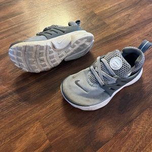 Nike grey tennis shoes. Size 10c